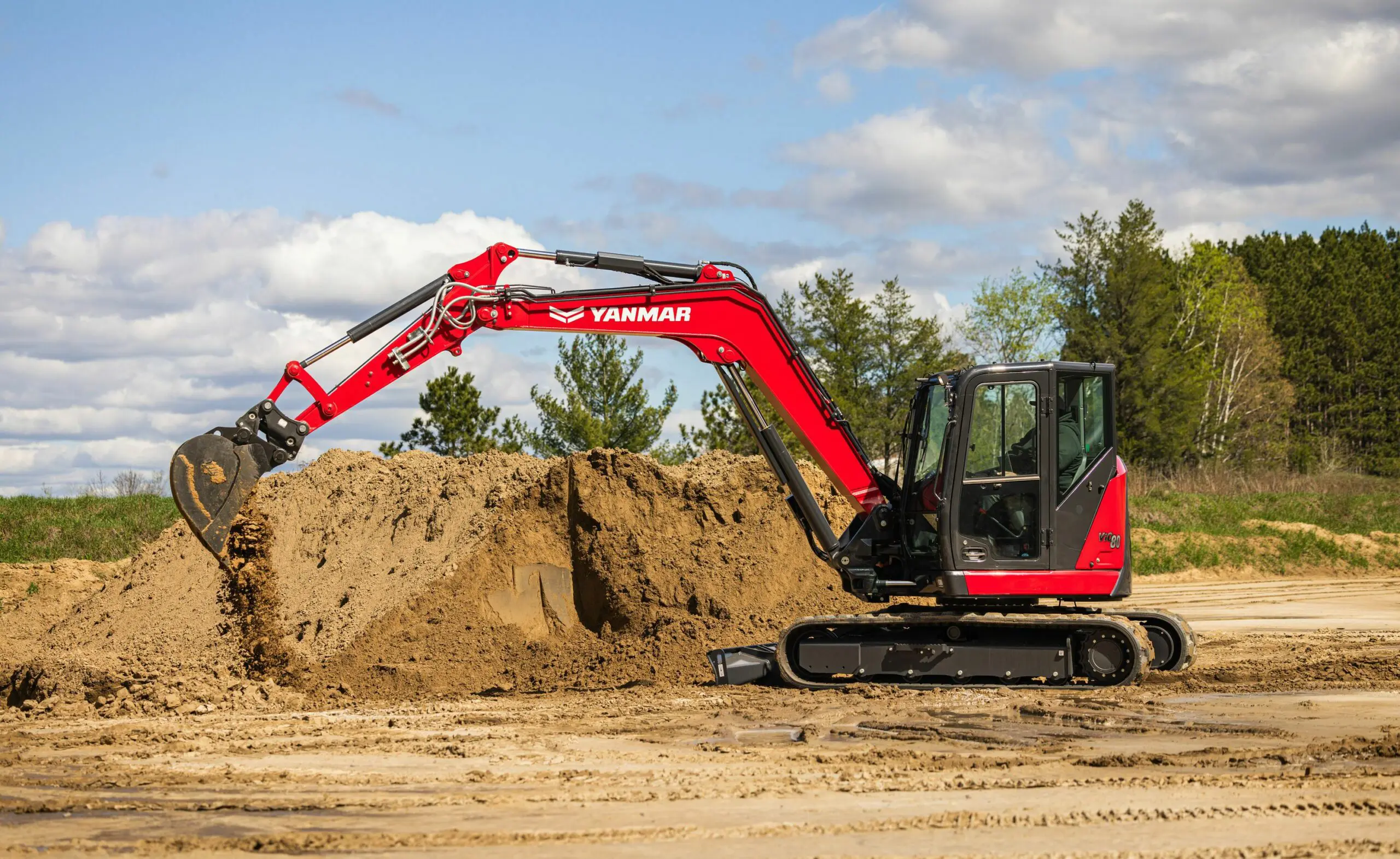 Mini Excavator ViO80-7 excavating.