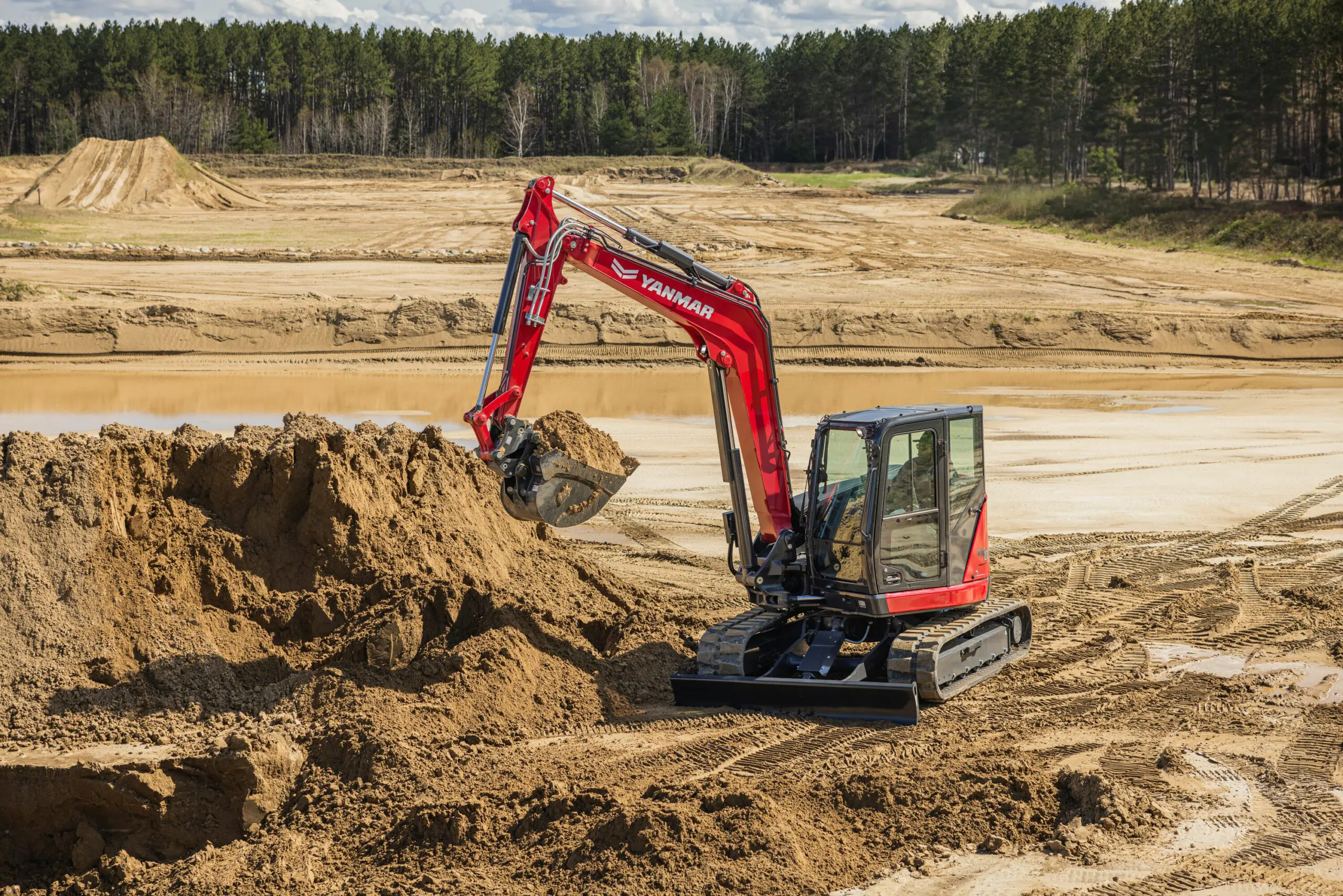 Mini Excavator ViO80-7 excavating.