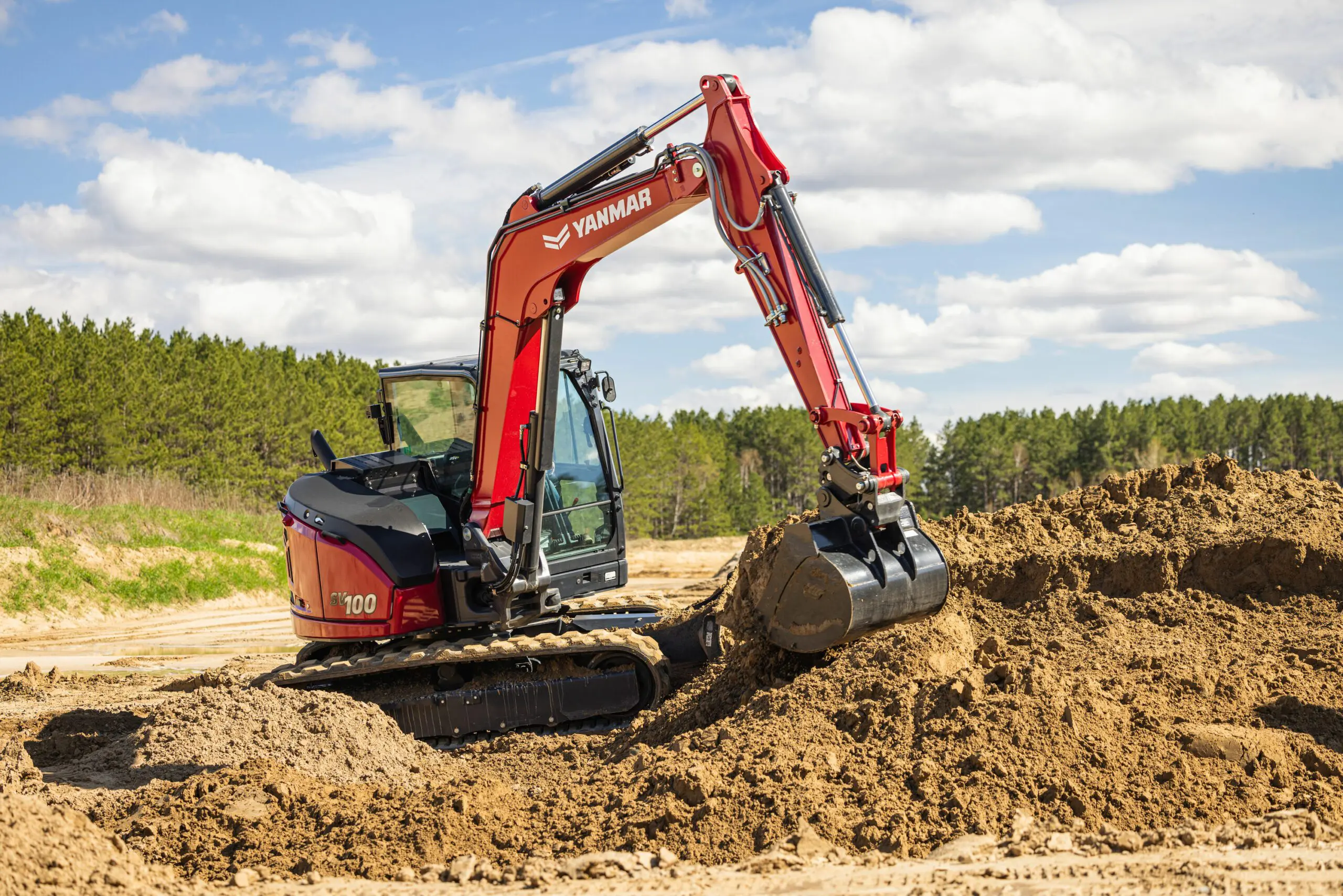 Mini Excavator SV100-7 excavating.
