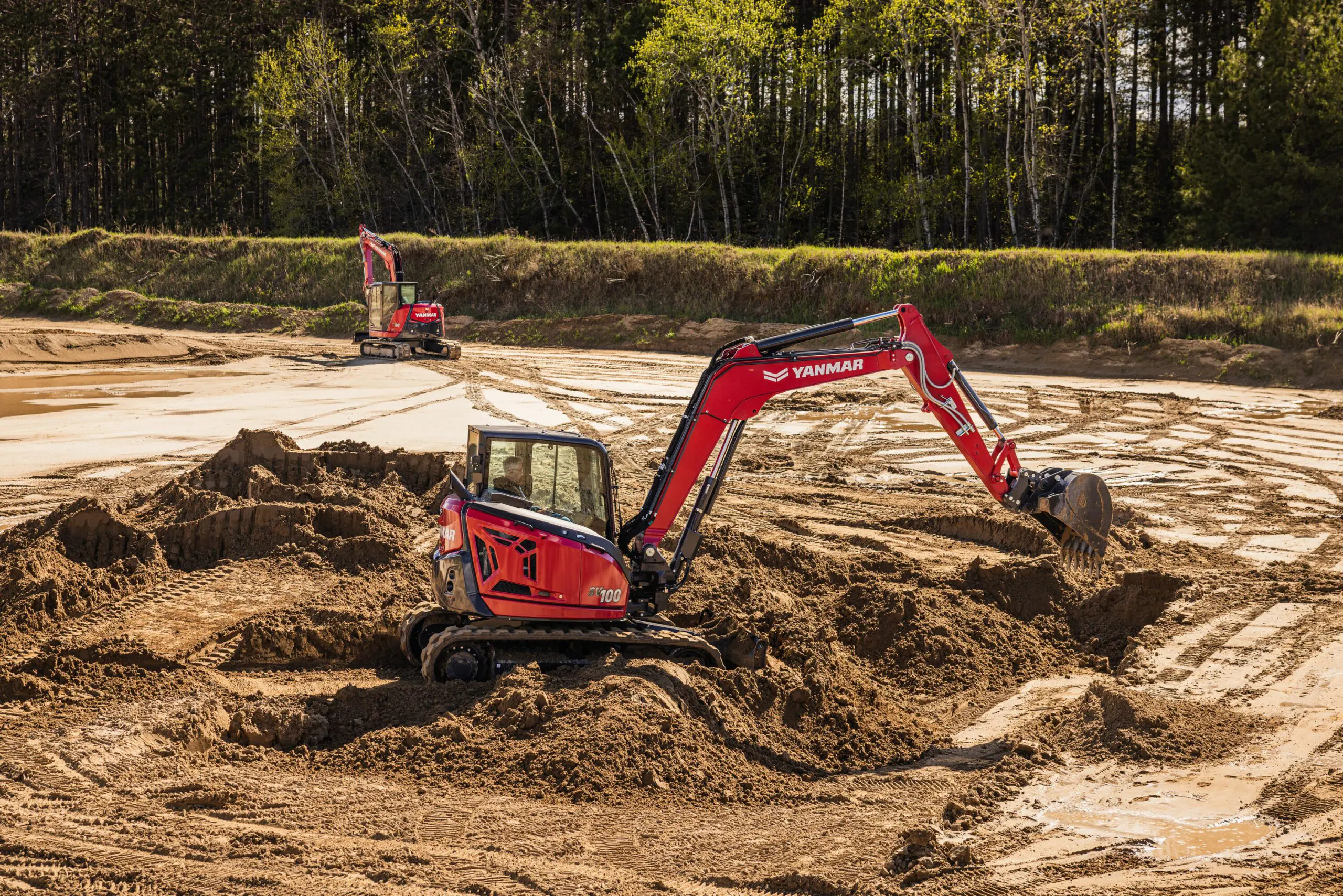 Mini Excavator SV100-7 excavating.