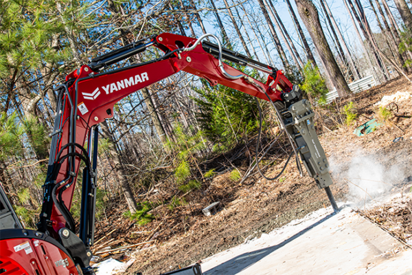 Mini Excavator ViO55-6A with a hydraulic hammer.