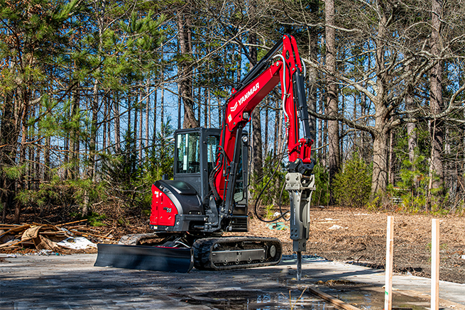 Mini Excavator ViO55-6A with a hydraulic hammer.