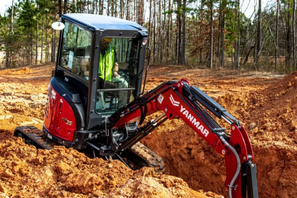 Yanmar Mini Excavator ViO35-6A deep in dirt.